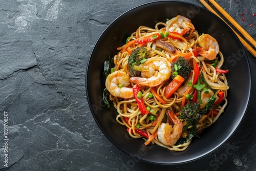 Top view stir fry noodles with vegetables and shrimps. photo