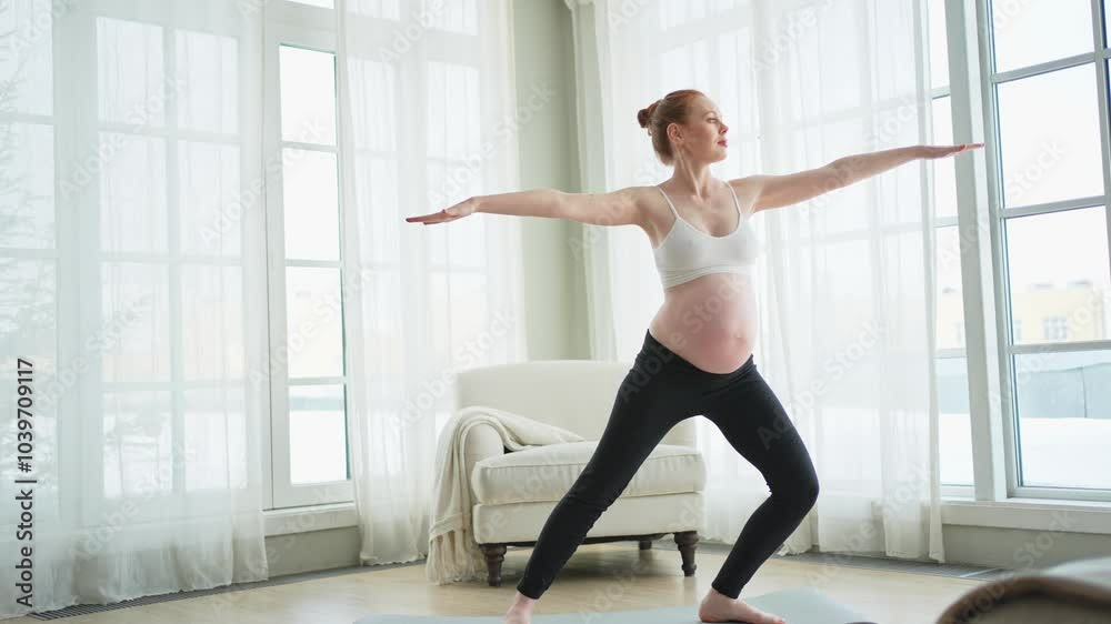 Pregnancy yoga fitness workout training. Pregnant woman practicing yoga at home. Pregnant girl doing sports exercise on yoga mat indoor. Woman with big belly have fitness training practicing asana Pregnancy yoga fitness workout training. Pregnant woman practicing yoga at home. Pregnant girl doing sports exercise on yoga mat indoor. Woman with big belly have fitness training practicing asana