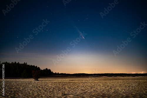 Comet C/2023 A3 Tsuchinshan-ATLAS visible in night sky after sunset in the Desert. photo