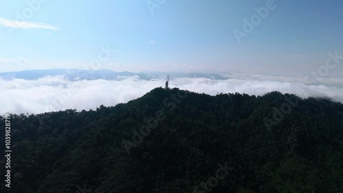 Fly towards Skywalk Aiyerweng with the sea of mist in the background photo