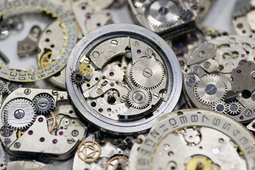 Old mechanical watches with gears and cogs. Watch or clock mechanisms