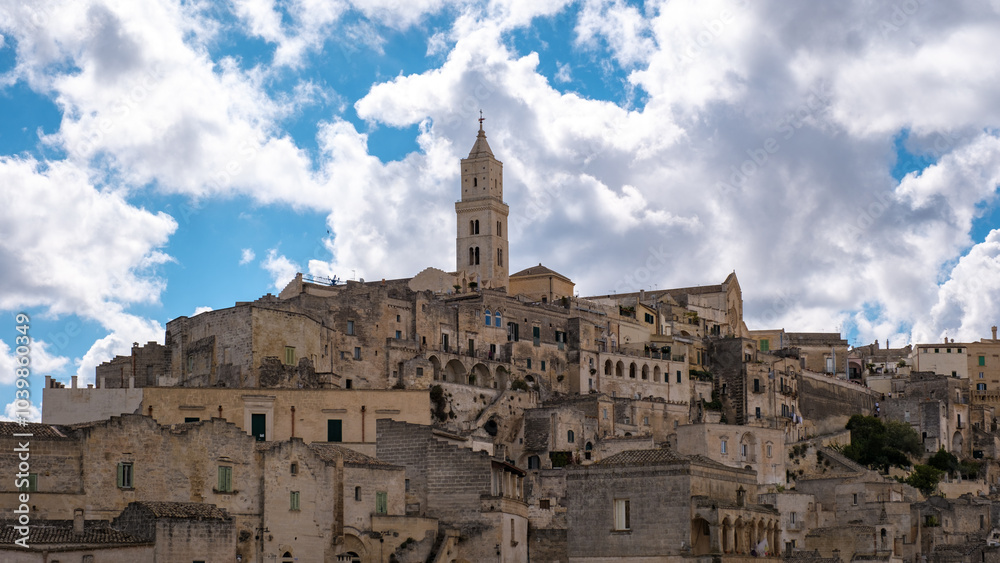 Fototapeta premium Exploring the enchanting cliffs of Matera in Puglia, Italy under a dramatic sky