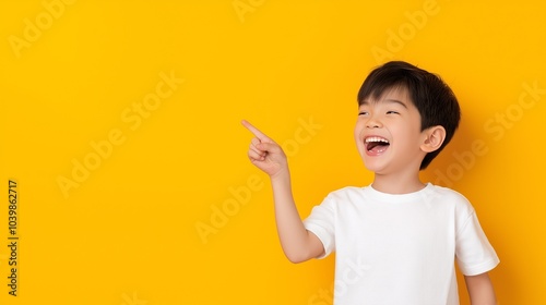 Asian boy pointing finger 