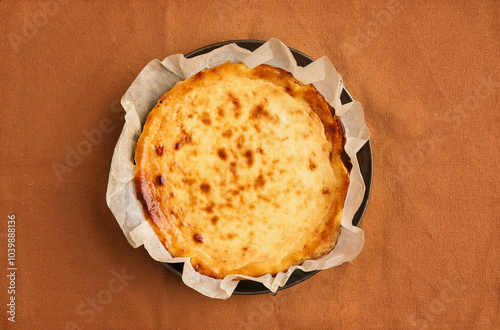 Cheesecake dessert for Thanksgiving. Copy space, flat lay. Basque dessert. Homemade baking. Fall recipe vibes . photo