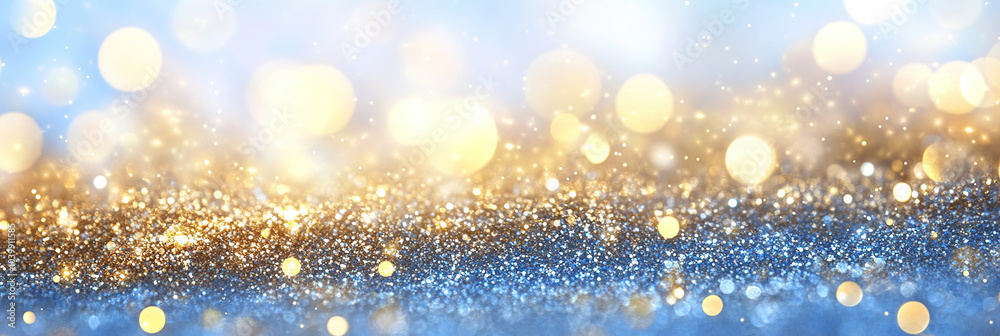 Sparkling Blue and Gold Glitter Background with Bokeh Lights Sparkling Blue and Gold Glitter Background with Bokeh Lights