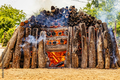 Photography Stacked large logs (wood) and lit from within