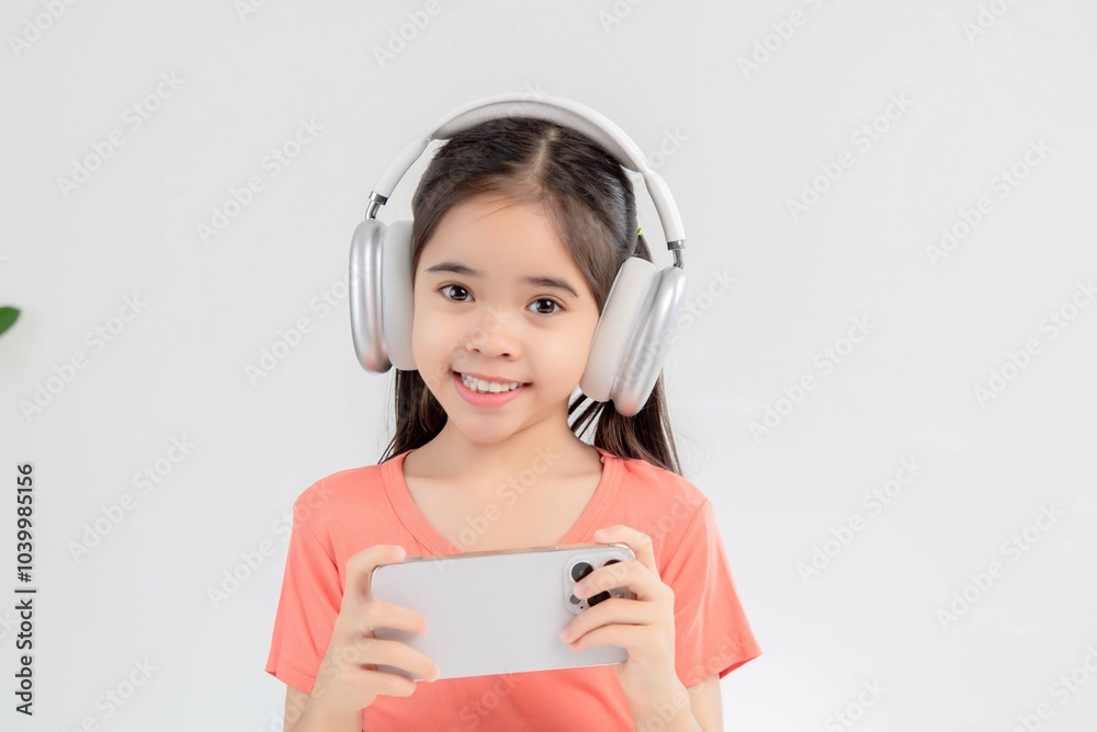 asia cute Girl playing game on a smartphone. asia cute Girl playing game on a smartphone.