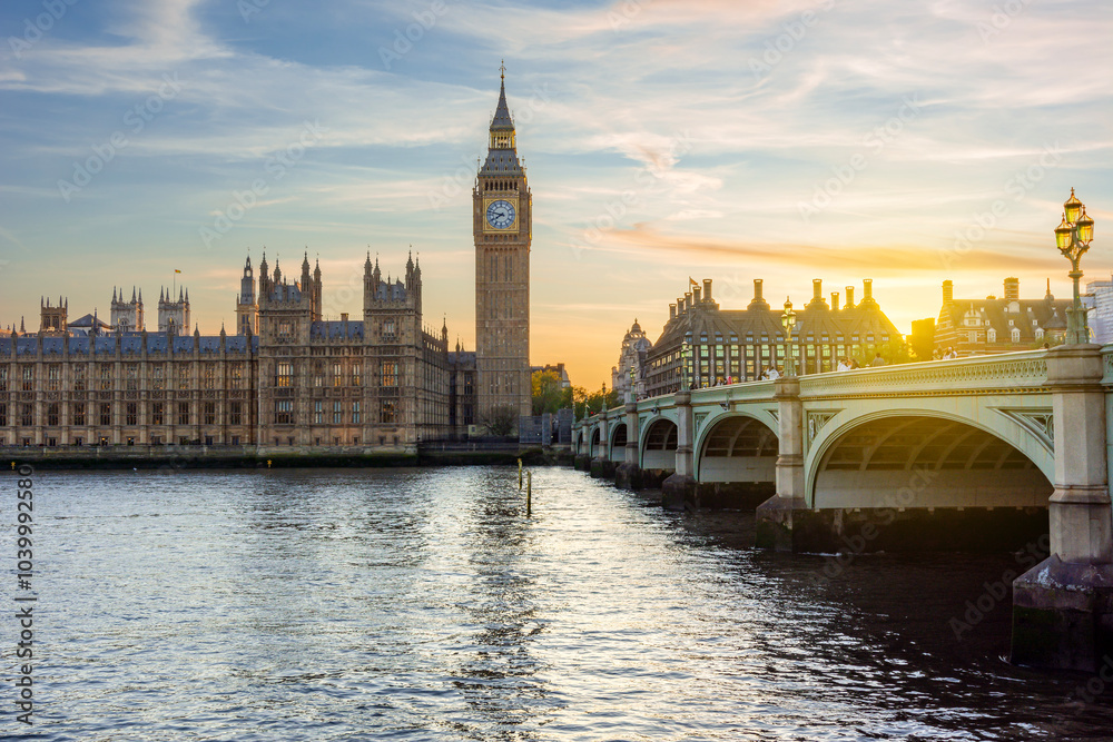 Houses of Parliament with Big Ben tower and Westminster bridge at sunset, London, UK Houses of Parliament with Big Ben tower and Westminster bridge at sunset, London, UK