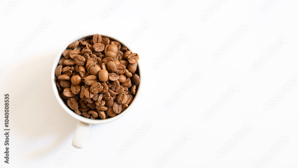 A white cup atop a bed of coffee beans, capturing the essence of fresh coffee and convenience. A white cup atop a bed of coffee beans, capturing the essence of fresh coffee and convenience.