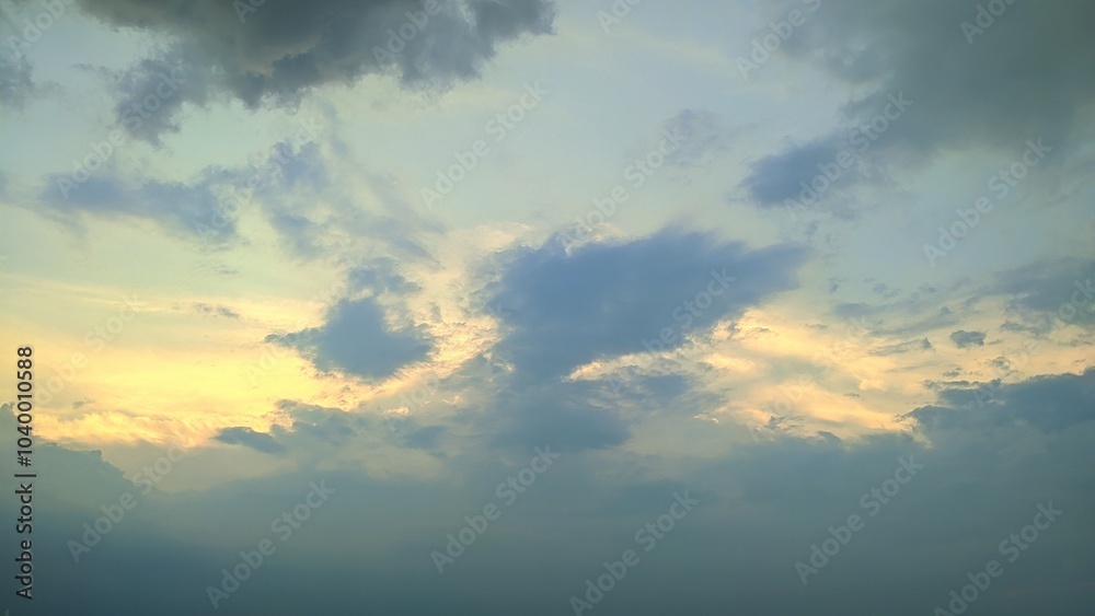 Dramatic cloudscape at sunset, golden light breaking through dark clouds. Perfect for nature, weather, or mood-related projects. Dramatic cloudscape at sunset, golden light breaking through dark clouds. Perfect for nature, weather, or mood-related projects.