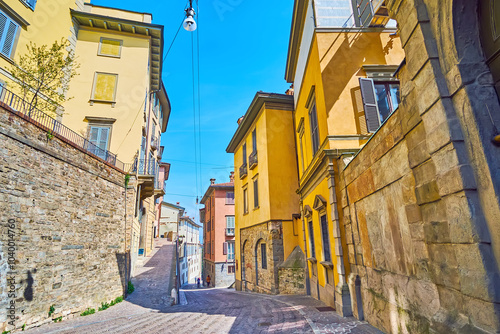 Walk down Via Porta Dipinta street in Citta Alta, Bergamo, Italy