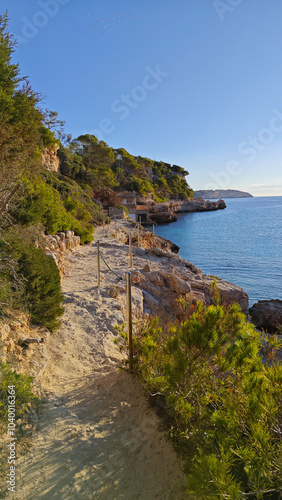 shore of cala llombards beach in mallorca photo