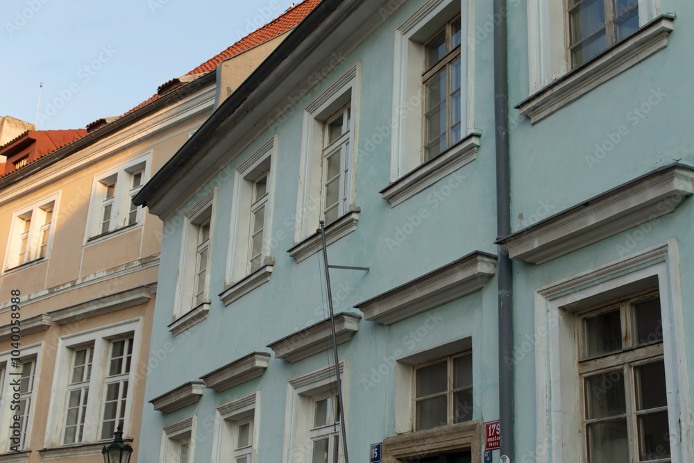 Elegant buildings showcasing classic architectural design with soft pastel hues in a serene urban setting and ambiance Elegant buildings showcasing classic architectural design with soft pastel hues in a serene urban setting and ambiance