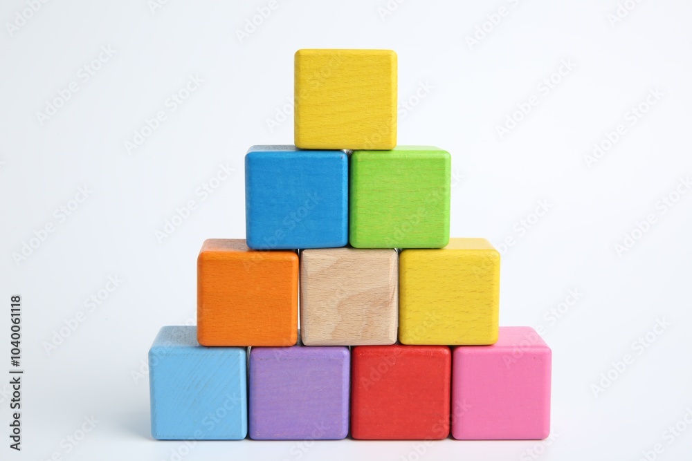 Pyramid of colorful cubes on white background Pyramid of colorful cubes on white background