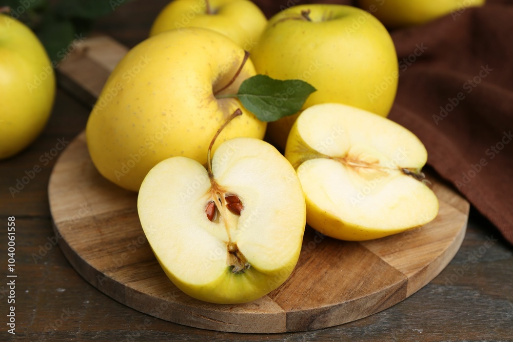 Fresh ripe yellow apples on wooden table, closeup Fresh ripe yellow apples on wooden table, closeup