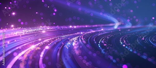 Purple light trail with spots of light against a blue background perfect for a technology themed copy space image concept