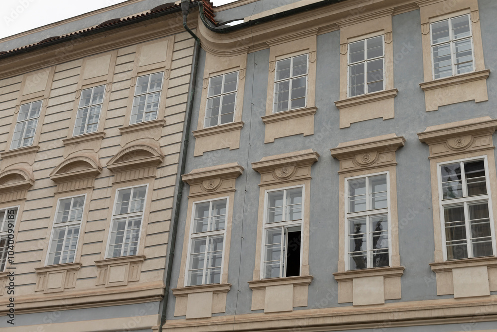 Fototapeta premium A beautifully detailed and intricate building facade showcasing elegant windows along with classic design elements