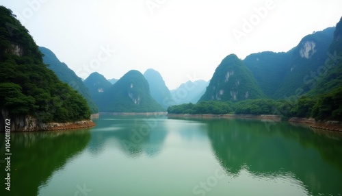  Tranquil lake nestled among lush green mountains