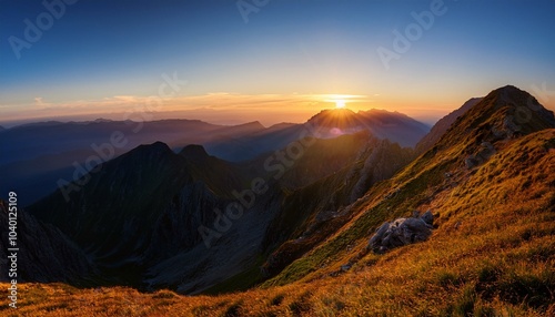 early dawn in the mountains the sun just came from behind the top of the mountain