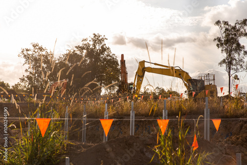 earth works for a new housing estate with diggers and orange bunting photo