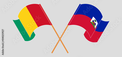 Crossed and waving flags of Guinea and Republic of Haiti. Vector illustration