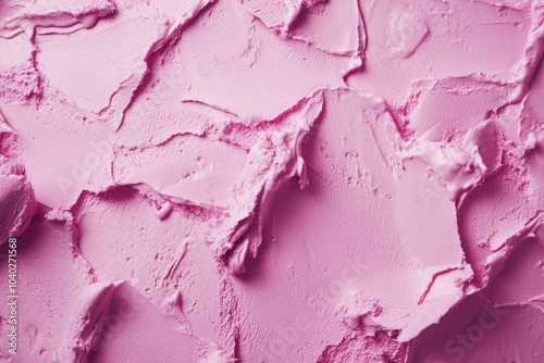 A close-up shot of pink paint on a wall