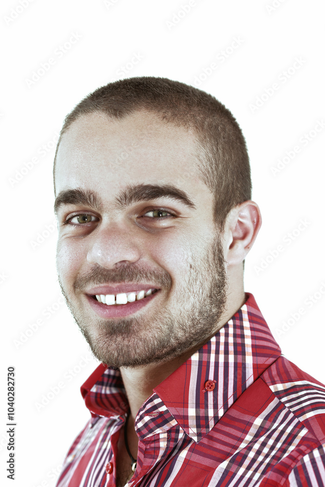 Obraz premium Young man with short hair and red shirt smiling on white backgro