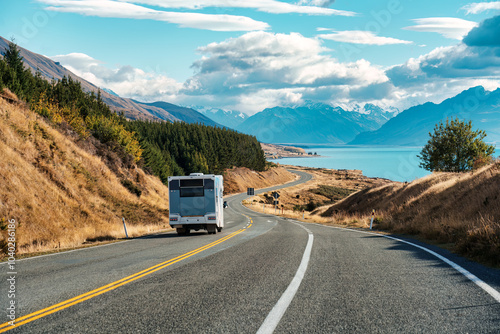 Fototapeta Naklejka Na Ścianę i Meble -  Road trip with motorhome driving on road and Mount Cook by Lake Pukaki at Peters lookout, New Zealand