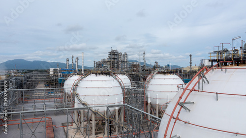 Aerial view spherical tank storage liquefied gas petrochemical, Horton sphere gas storage tank, Spherical liquefied petroleum refinery, Liquefied natural gas tank industrial spherical storage tank. photo