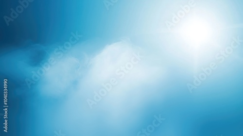 Abstract blue background featuring soft sun rays and gentle smoke effects. The light effect creates a dreamy atmosphere with blurred elements, making it ideal for creative designs. This high-quality b