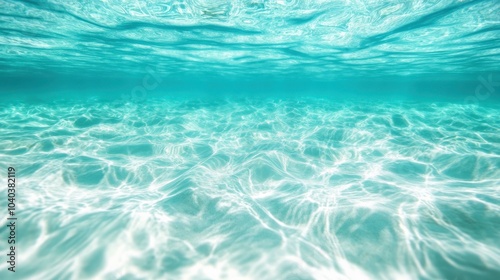 A mesmerizing underwater scene showcasing crystal-clear water with light forming intriguing patterns on a sandy bed, emphasizing calmness and purity.