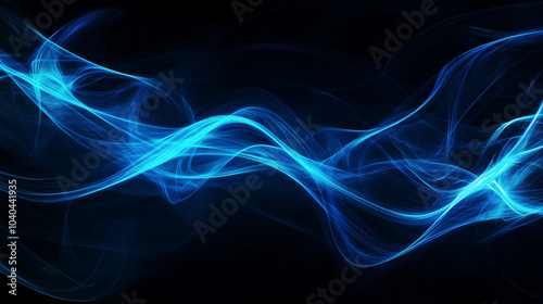 Abstract blue light trails in motion on a dark background