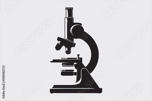 Silhouette of a classic laboratory microscope.