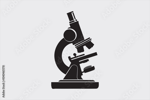 Silhouette of a classic laboratory microscope.