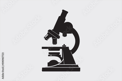 Silhouette of a classic laboratory microscope.