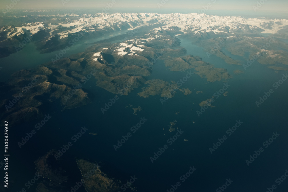 Aerial view of frozen Juneau ice field with snowy mountains and glacier, Alaska, United States. Aerial view of frozen Juneau ice field with snowy mountains and glacier, Alaska, United States.