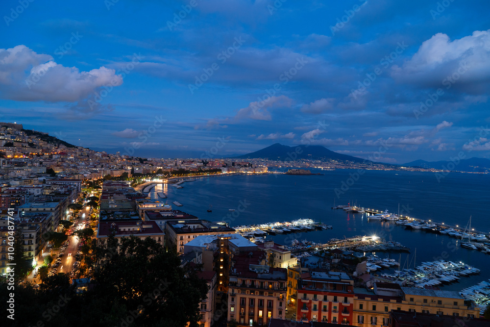 Obraz premium panoramic cityscape Naples with Vesuvius volcano at night, Italy