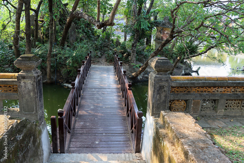 wooden bridge in the park of ancient Hue capital