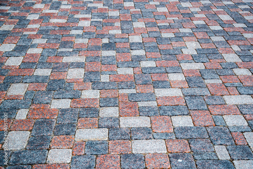 Winter day view of textured cobblestone street in Vilnius, Northern Lithuania, Europe