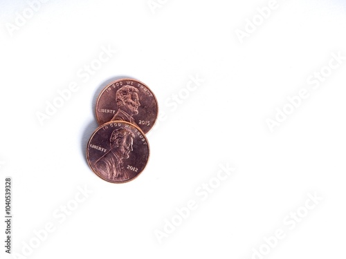 Advice concept with two pennies on white background