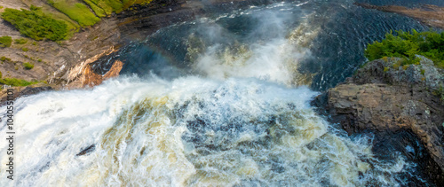 Head of the Montmorency Falls seen from a suspension bridge, Quebec City, Quebec, Canada photo