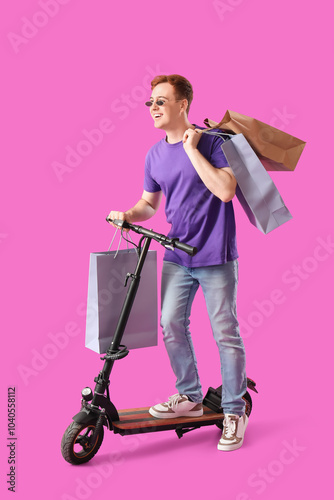Happy young redhead man wit...