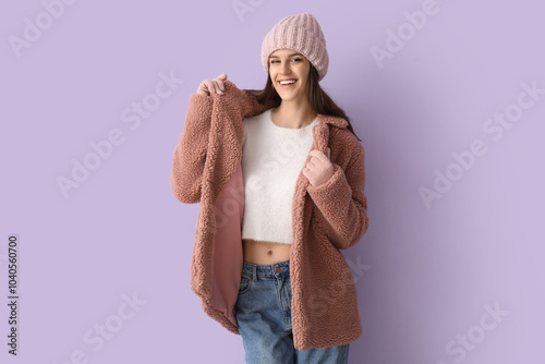 Young woman in teddy coat o...