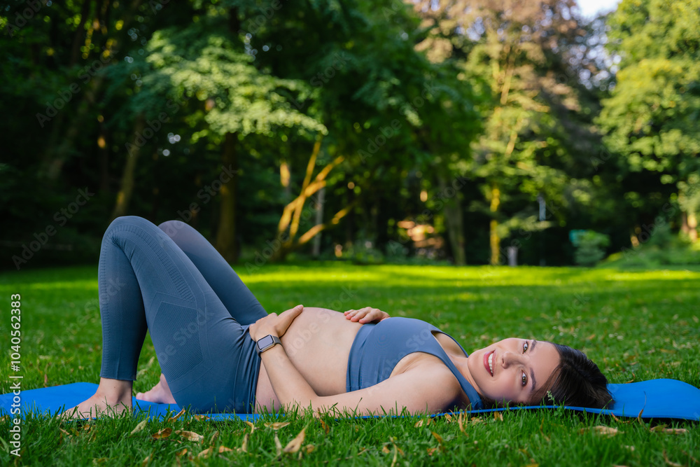 Mother expecting baby resting after practicing yoga enjoying relaxation Mother expecting baby resting after practicing yoga enjoying relaxation