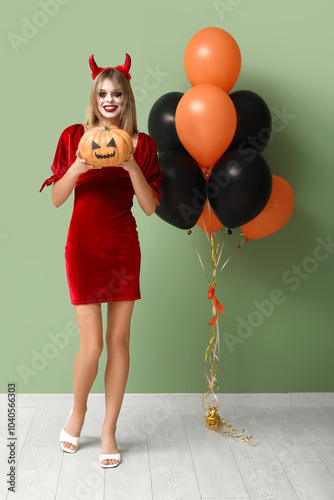 Young woman dressed for Hal...