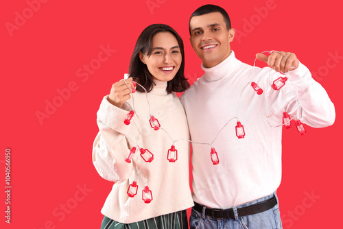 Happy young couple with Chr...