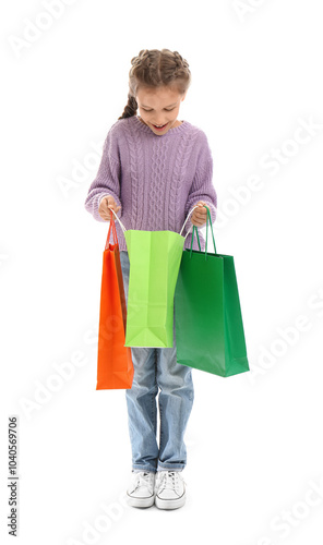 Little girl with shopping b...