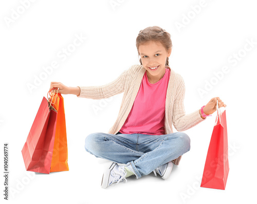 Little girl with shopping b...