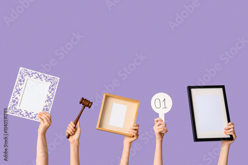 Female hands with auction p...