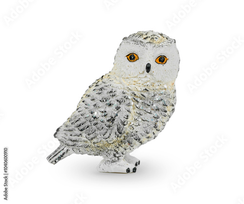 The owl toy is isolated on a white background.